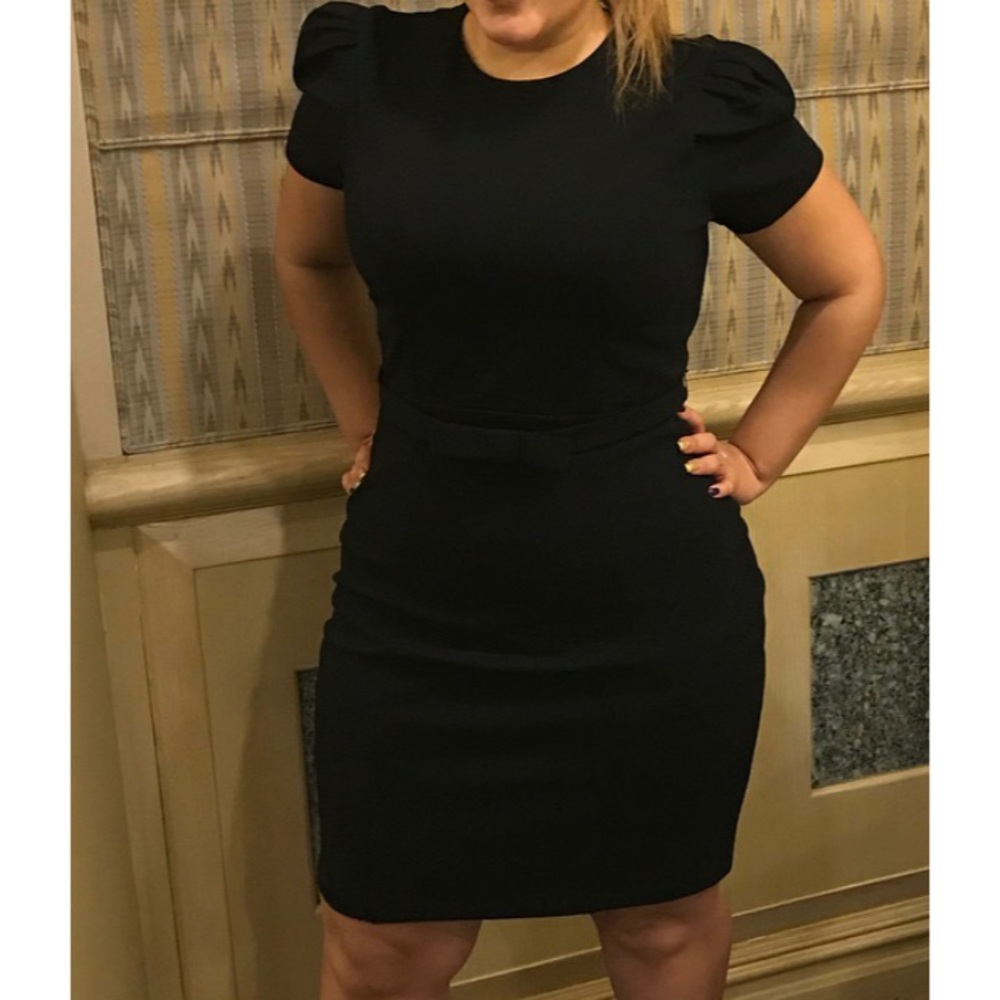 Black puffed shoulder dress